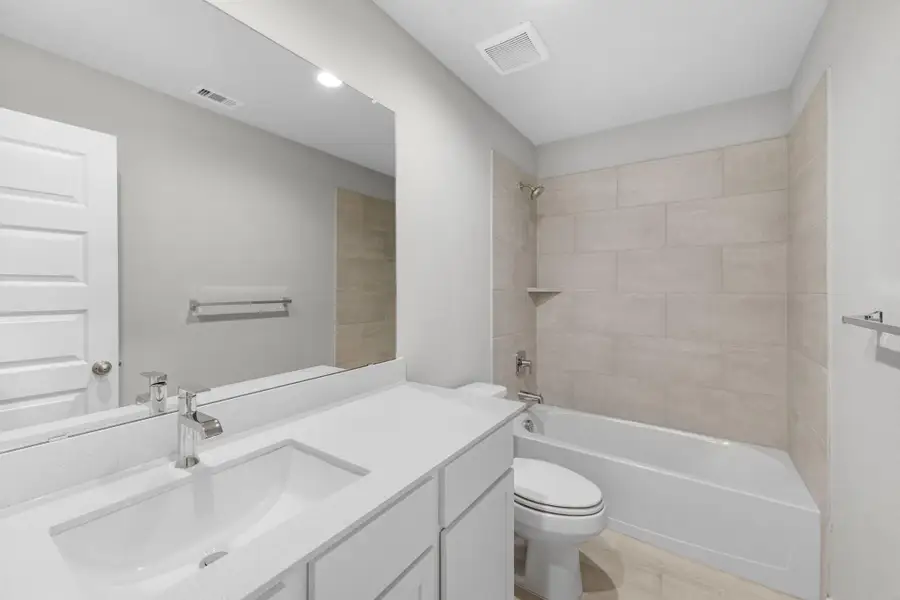 Furnished interior view inside a new home in Grand Oaks Village, Houston (Image 11).