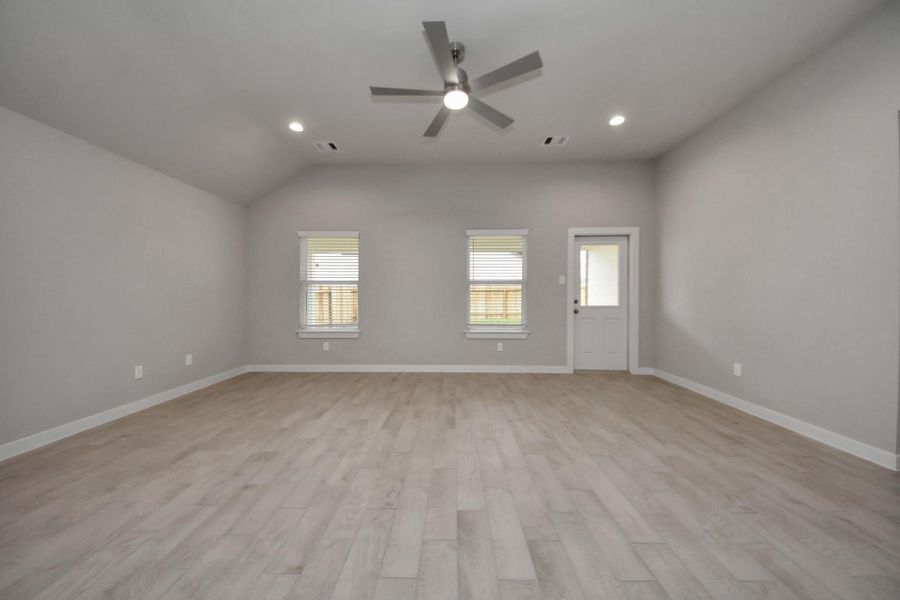 Take another glimpse into the heart of the home with this additional view of thefamily room—a sprawling space ready to accommodate all your gatherings. Sample photo of completed home with similar floor plan. Actual colors and selections may vary. Take another glimpse into the heart of the home with this additional view of thefamily room—a sprawling space ready to accommodate all your gatherings. Sample photo of completed home with similar floor plan. Actual colors and selections may vary.