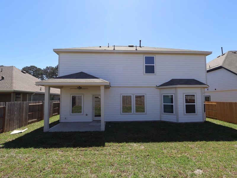 Exterior details and patio area of a home in Moran Ranch, Willis (Image 19).