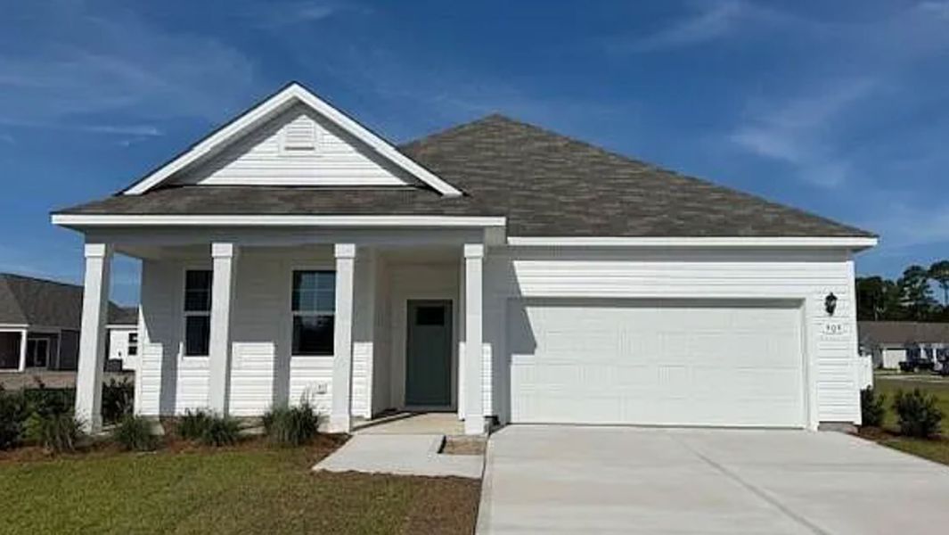 Front exterior of a new home in Stanbury Creek, Supply, NC, highlighting curb appeal (Image 1). Front exterior of a new home in Stanbury Creek, Supply, NC, highlighting curb appeal (Image 1).