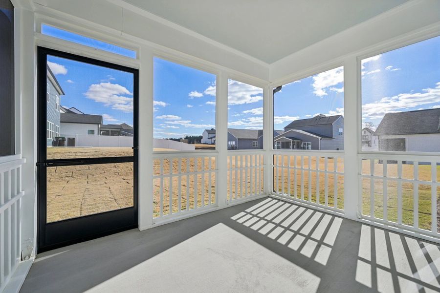 Screened-In Porch featuring AW Collection® Oxford - A year-round retreat that brings the outdoors in.