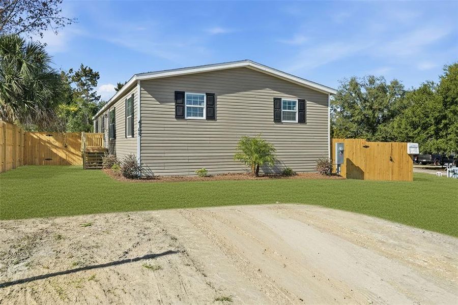 Exterior details and patio area of a home in , Brooksville (Image 21).