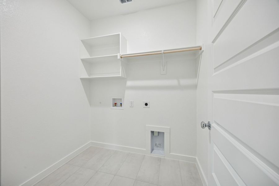 Utility Room in the Stanley II home plan by Trophy Signature Homes – REPRESENTATIVE PHOTO Utility Room in the Stanley II home plan by Trophy Signature Homes – REPRESENTATIVE PHOTO