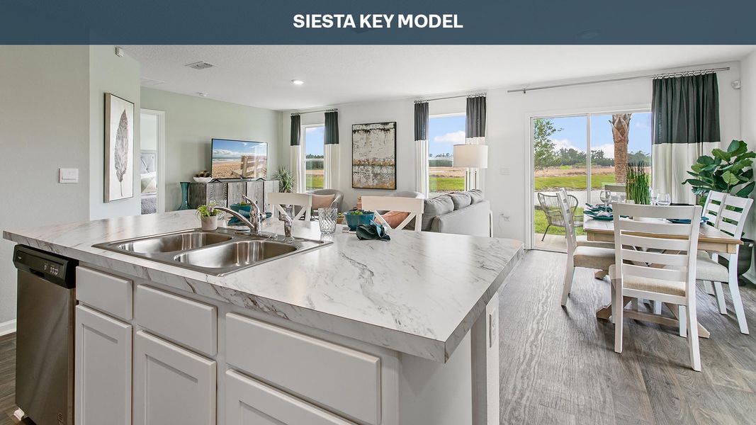 Representative furnished interior of a home built from the Siesta Key by D.R. Horton in Sawmill Branch Express, Palm Coast (Image 9).