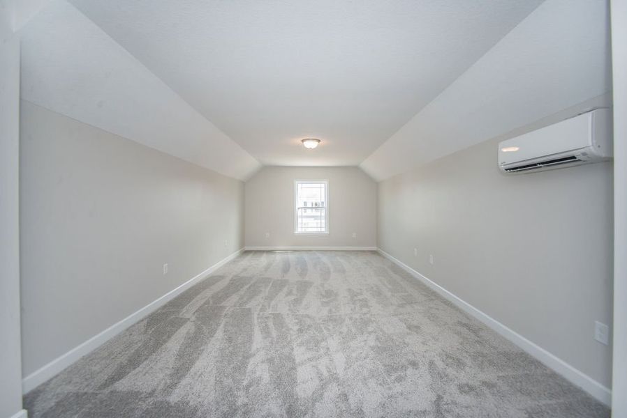Representative unfurnished interior of a home built from the Quincy by Enchanted Homes in Hampshire Heights, Moore (Image 36).