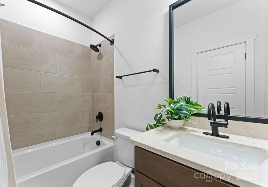 Photo is of model home in community, finishes may vary