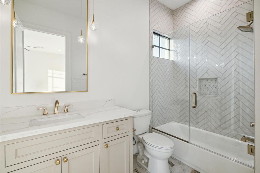 Secondary bedrooms are each appointed with baths en-suite and sizable closets with built-ins*Picture is of a recently constructed home by the builder.  1519 Candlelight will be similar in quality, but these pictures are not meant to be an exact representation of the new home. Specs of home may change at sole discretion of the seller.