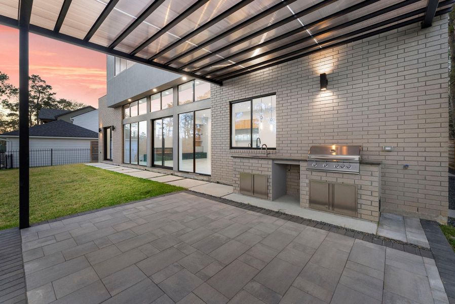 Exterior details and patio area of a home in , The Woodlands (Image 31).