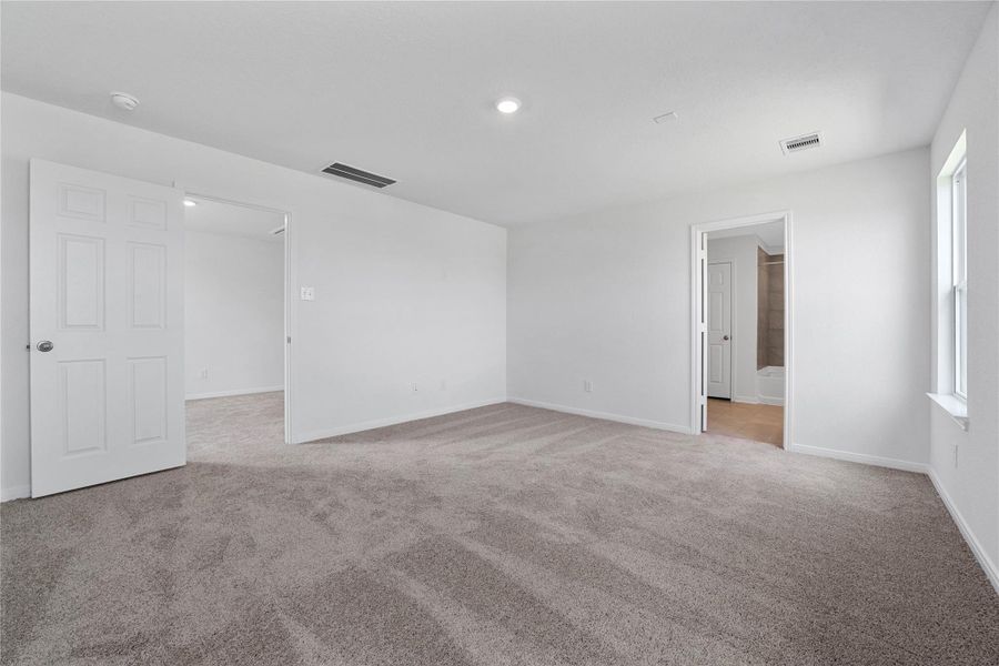 Additional view from primary bedroom looking out to the Loft and the primary bathroom. Additional view from primary bedroom looking out to the Loft and the primary bathroom.