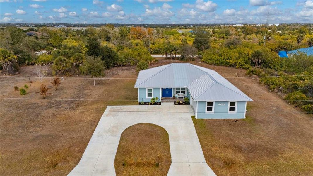 Front exterior of a new home in , Port Charlotte, FL, highlighting curb appeal (Image 25). Front exterior of a new home in , Port Charlotte, FL, highlighting curb appeal (Image 25).