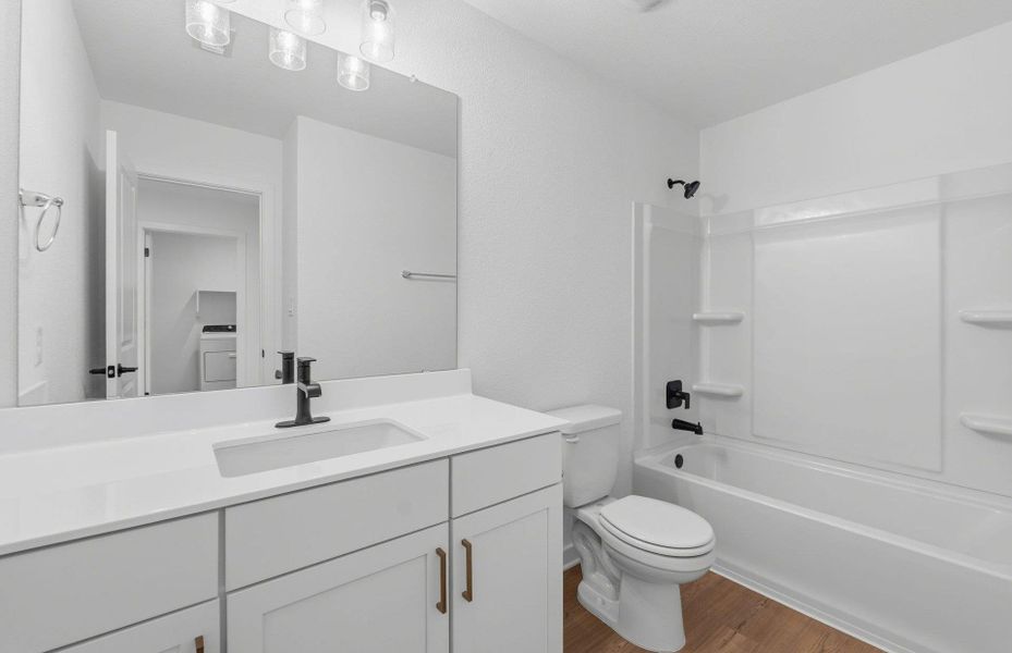 Furnished interior view inside a new home in Santa Rita Ranch, Liberty Hill (Image 12).