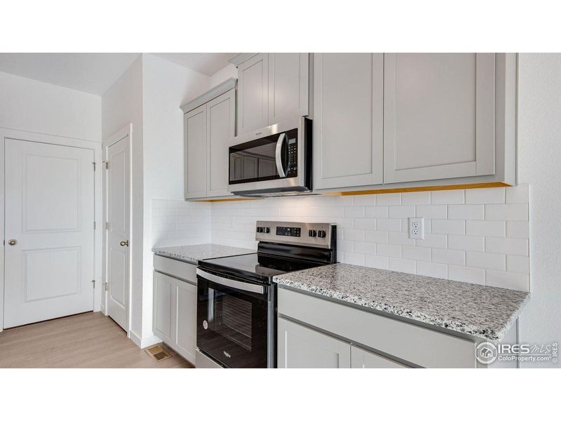 Furnished interior view inside a new home in Vista Meadows, Fort Lupton (Image 5).