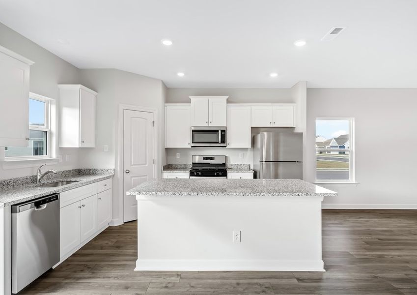 The Kitchen has wood cabinetry