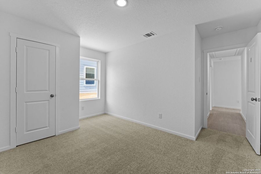 Spacious, unfurnished interior of a new home in Waterwheel: Cottage Collection, San Antonio (Image 19).