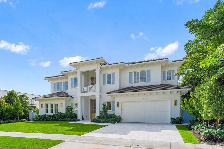 Front exterior of a new home in , Jupiter, FL, highlighting curb appeal (Image 2). Front exterior of a new home in , Jupiter, FL, highlighting curb appeal (Image 2).