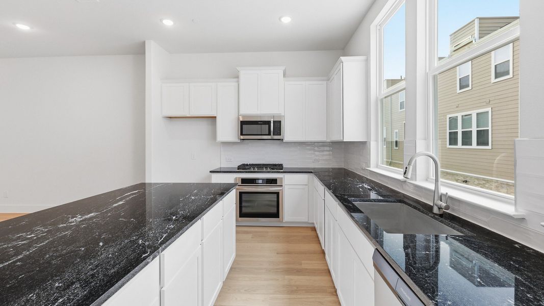 Furnished interior view inside a new home in Collin Creek, Plano (Image 30).