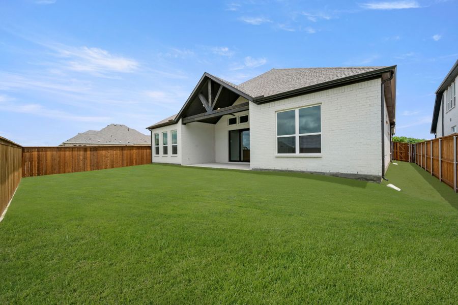 Exterior details and patio area of a home in Rio Vista at Kelly Ranch, Aledo (Image 3). Exterior details and patio area of a home in Rio Vista at Kelly Ranch, Aledo (Image 3).