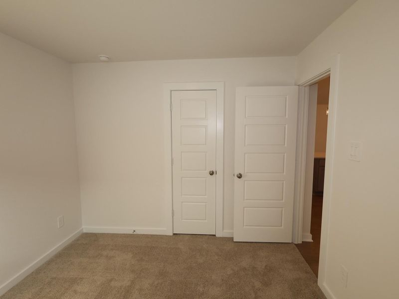 Spacious, unfurnished interior of a new home in Pinewood at Grand Texas, New Caney (Image 12).