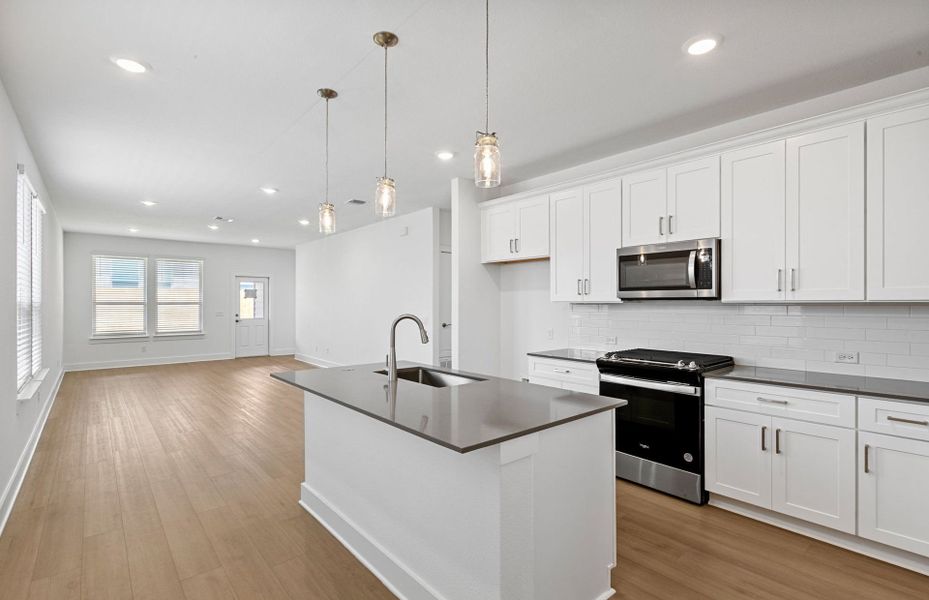 Furnished interior view inside a new home in Crosswinds, Kyle (Image 10).