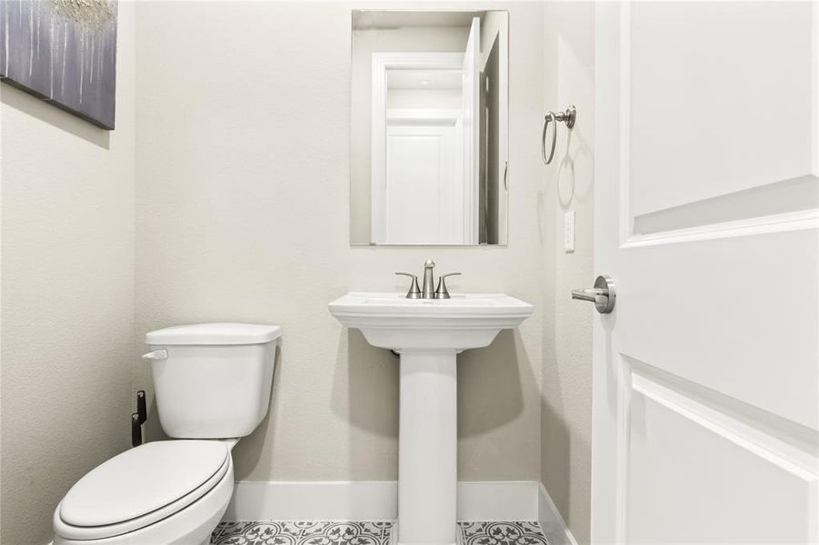 Bathroom with tile flooring and toilet