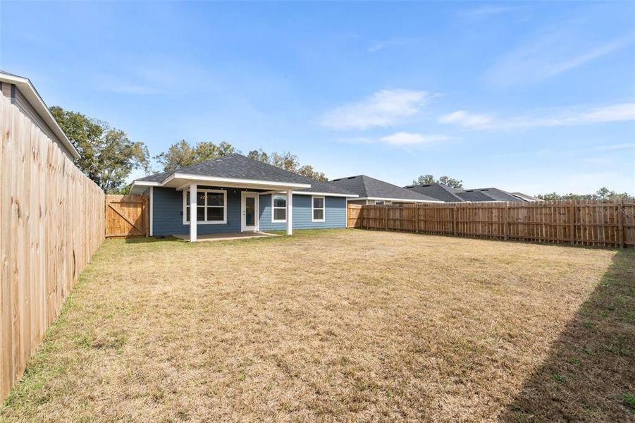 Exterior details and patio area of a home in Country Way South, Newberry (Image 23).