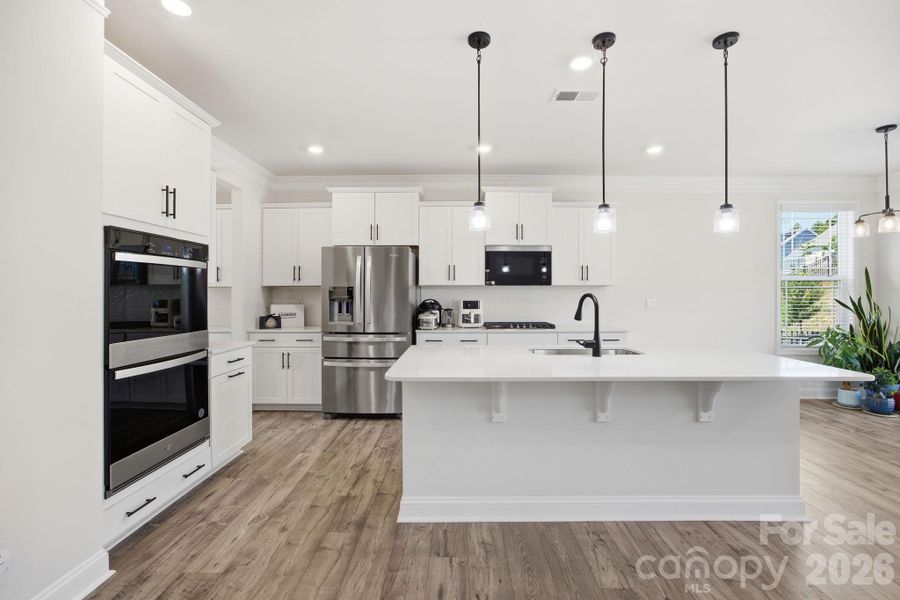 Gourmet Kitchen with double ovens and quartz counters Gourmet Kitchen with double ovens and quartz counters