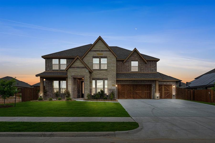 Front exterior of a new home in Homestead at Daniel Farms, DeSoto, TX, highlighting curb appeal (Image 2). Front exterior of a new home in Homestead at Daniel Farms, DeSoto, TX, highlighting curb appeal (Image 2).