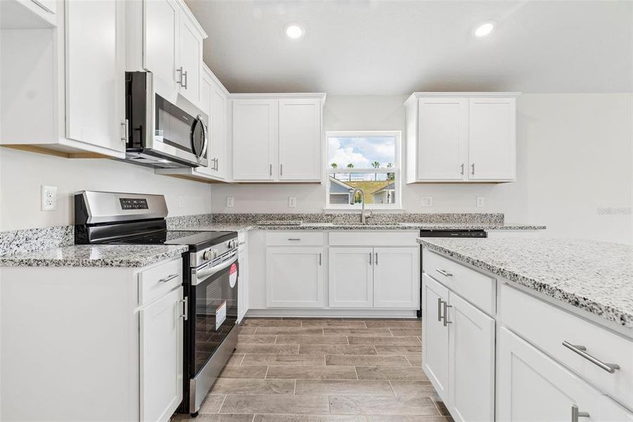 Furnished interior view inside a new home in Abbey Glen, Dade City (Image 17).