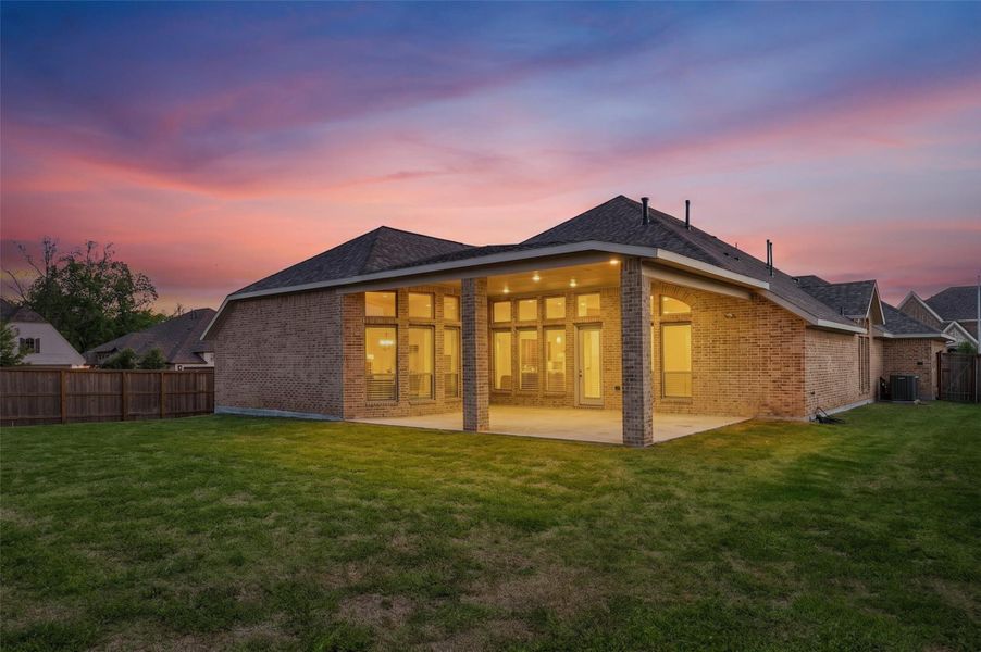 This backyard is a great place for an outdoor kitchen, pool, putting green.  You dream it and build it in the Texas-sized backyard.