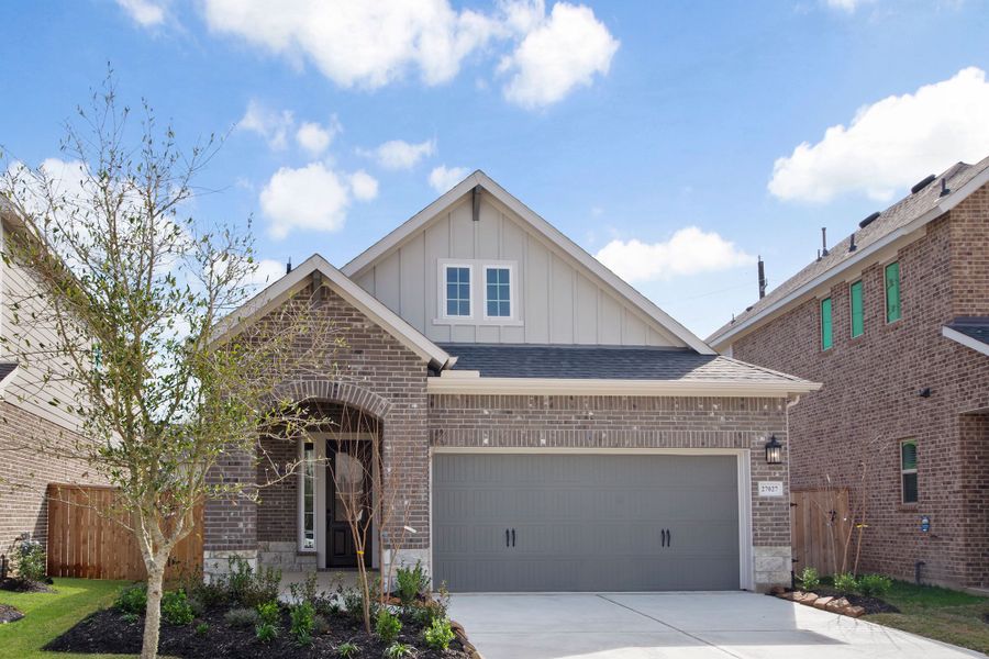 Representative exterior photo of a completed home built from the The Bingham by David Weekley Homes in Prairieland Village 40' Homesites, Cypress, TX (Image 17).
