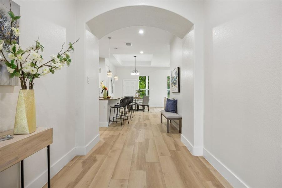 The wide front entry leads you into the open floor plan.
