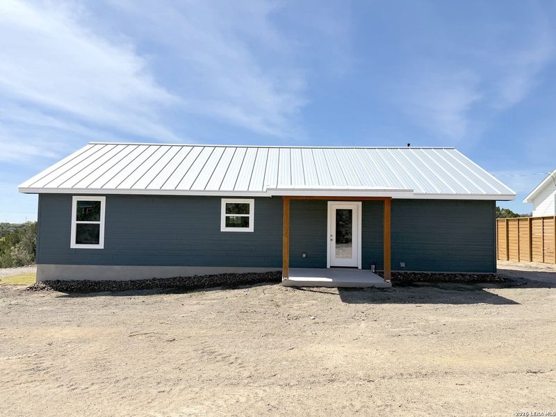 Exterior details and patio area of a home in , Spring Branch (Image 29).