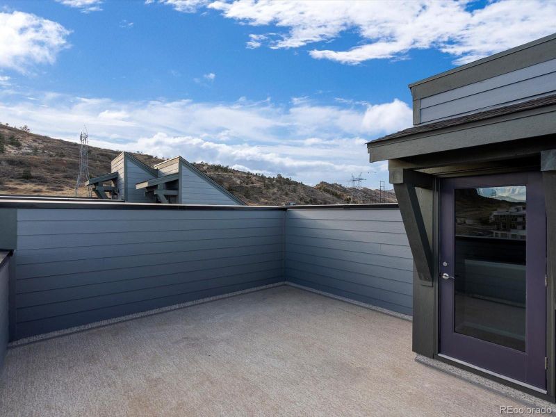 Exterior details and patio area of a home in Three Hills, Morrison (Image 4).