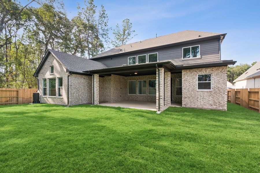 Exterior details and patio area of a home in ARTAVIA 65' Homesites, Conroe (Image 3).