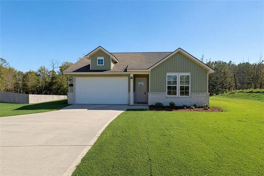 Front exterior of a new home in Ivy Glen, Perry, GA, highlighting curb appeal (Image 1). Front exterior of a new home in Ivy Glen, Perry, GA, highlighting curb appeal (Image 1).