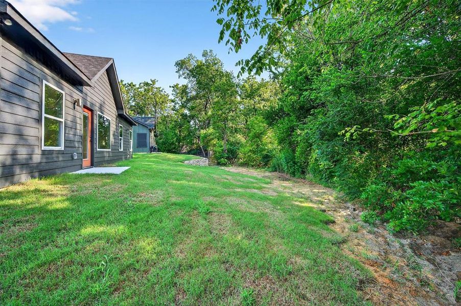 Front exterior of a new home in , Denison, TX, highlighting curb appeal (Image 2). Front exterior of a new home in , Denison, TX, highlighting curb appeal (Image 2).