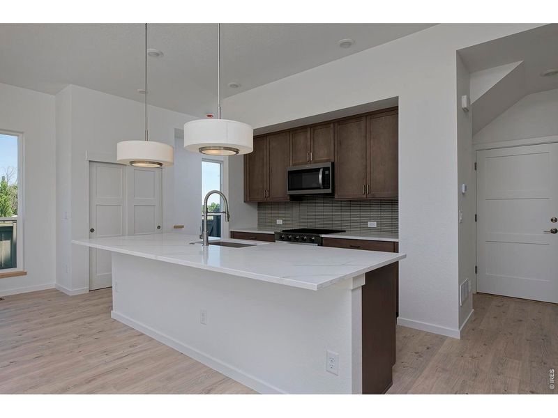 Furnished interior view inside a new home in West Grange, Longmont (Image 7).