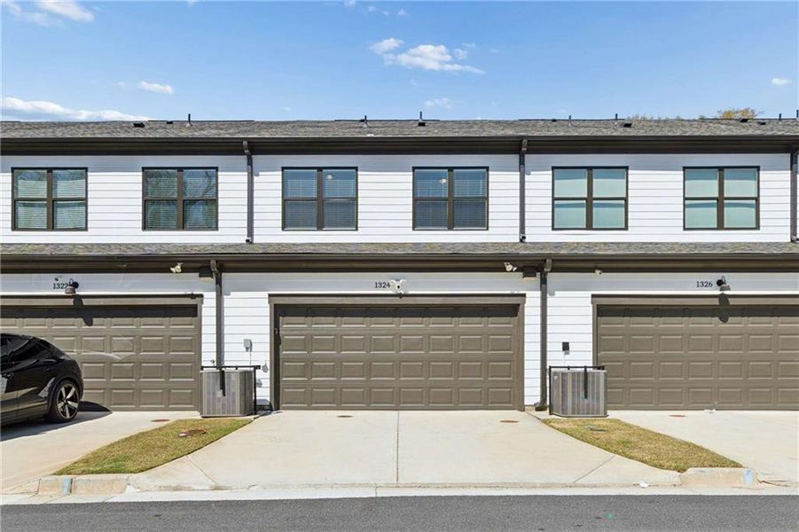 Front exterior of a new home in , Atlanta, GA, highlighting curb appeal (Image 23).