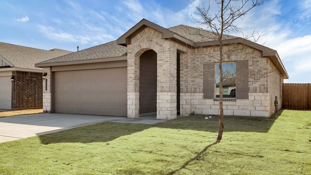 Front exterior of a new home in Terra Vista, Lubbock, TX, highlighting curb appeal (Image 15).