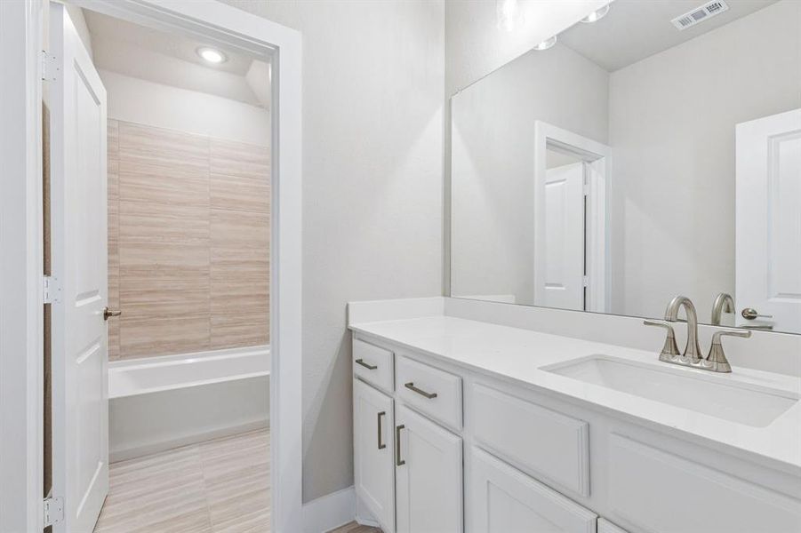 Furnished interior view inside a new home in Painted Tree Woodland West, McKinney (Image 11).