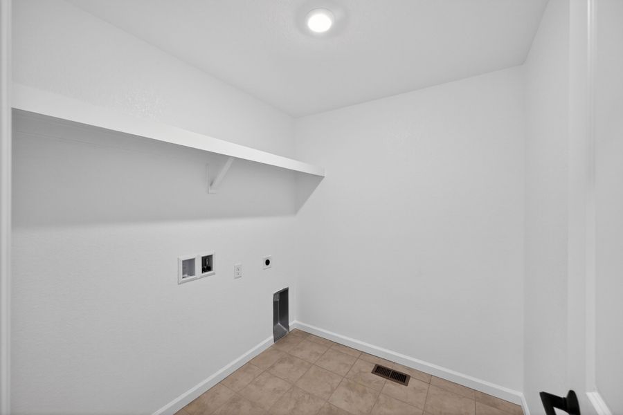 Spacious, unfurnished interior of a new home in The Town Collection at Independence, Elizabeth (Image 16).