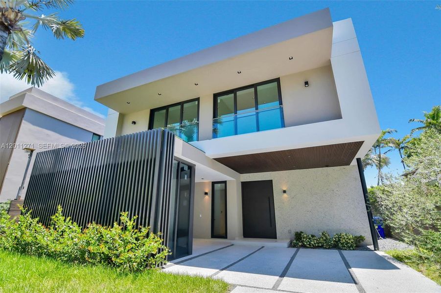 Front exterior of a new home in , Miami, FL, highlighting curb appeal (Image 29).