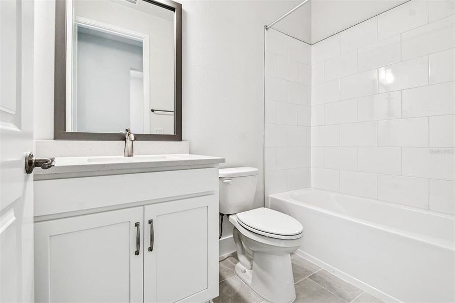 Furnished interior view inside a new home in North River Ranch - Cottage Series, Parrish (Image 10).