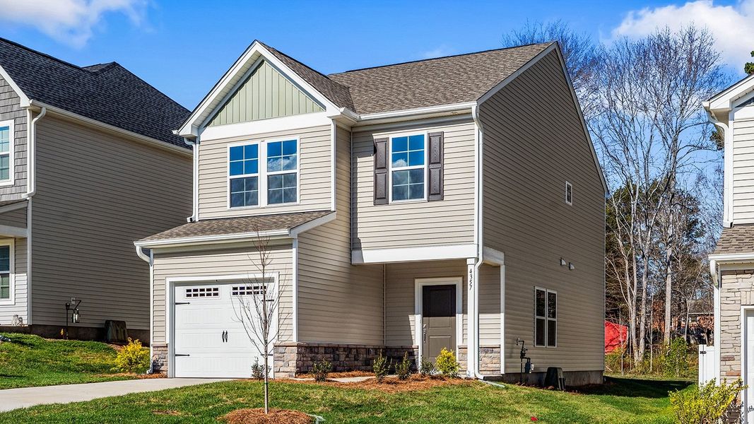 Front exterior of a new home in Hanes Lake, Winston-Salem, NC, highlighting curb appeal (Image 2).