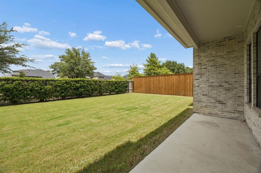 Exterior details and patio area of a home in , Frisco (Image 4). Exterior details and patio area of a home in , Frisco (Image 4).