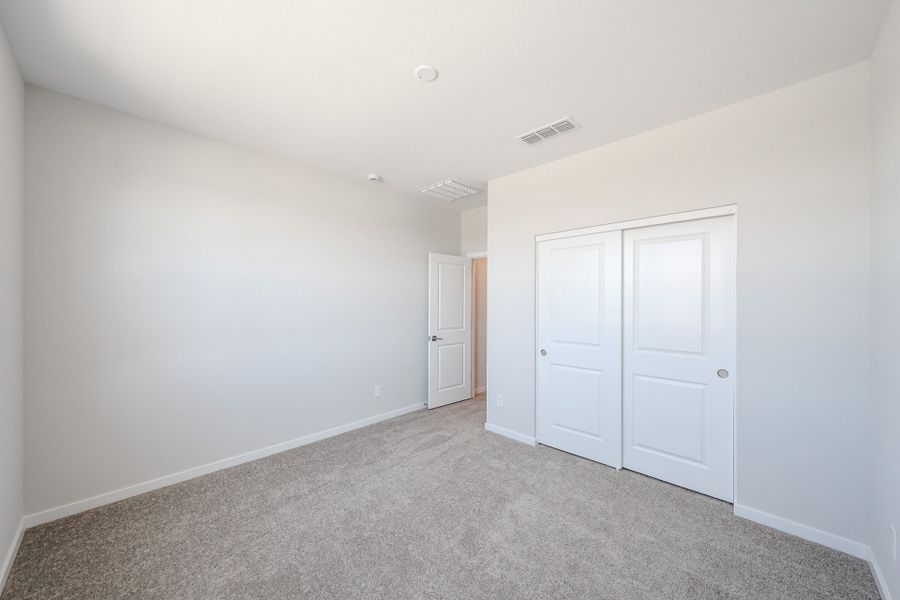 A room with white doors.