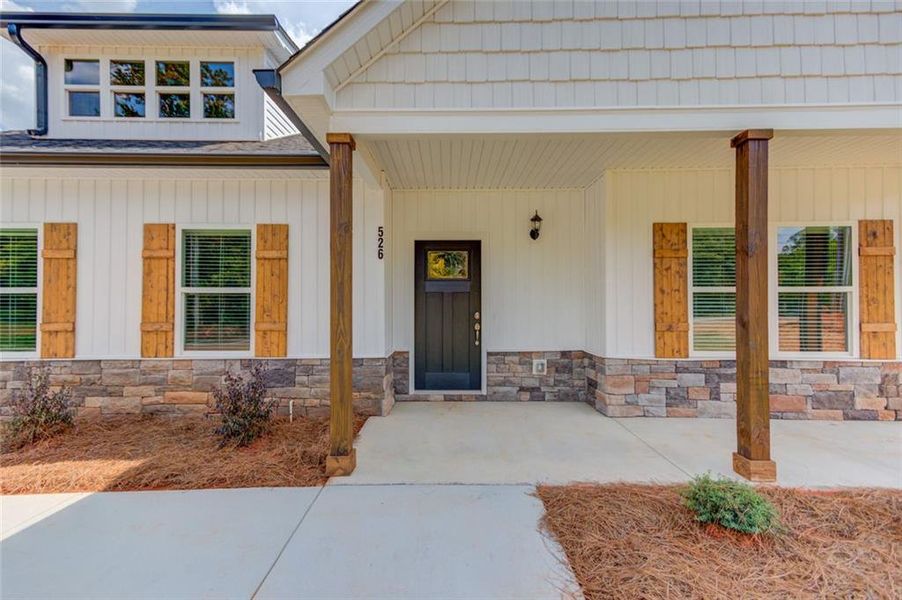 Front exterior of a new home in , Eastanollee, GA, highlighting curb appeal (Image 21). Front exterior of a new home in , Eastanollee, GA, highlighting curb appeal (Image 21).