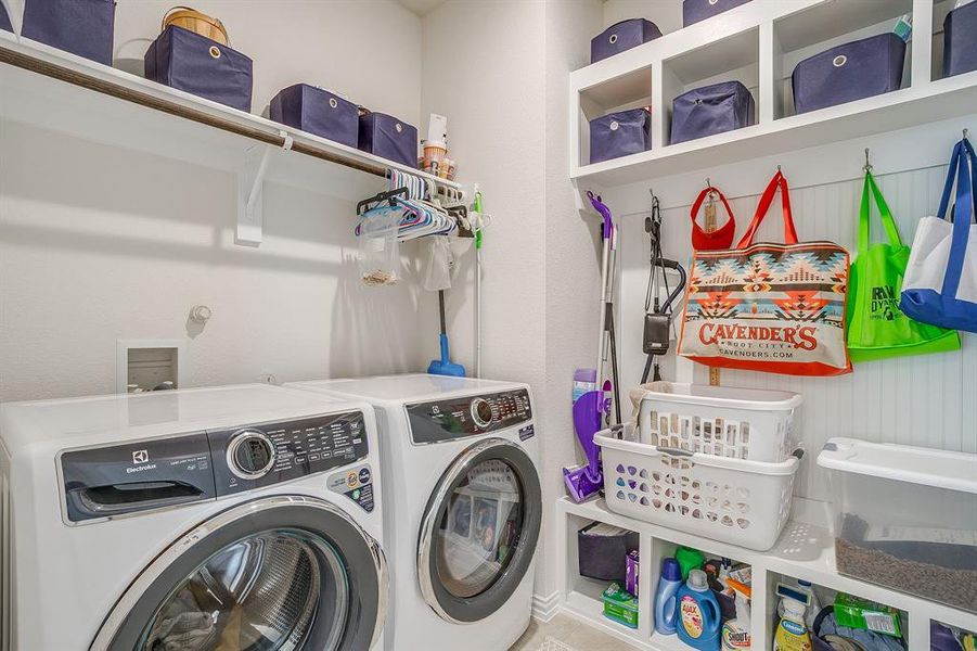 Washroom with washing machine and clothes dryer Washroom with washing machine and clothes dryer