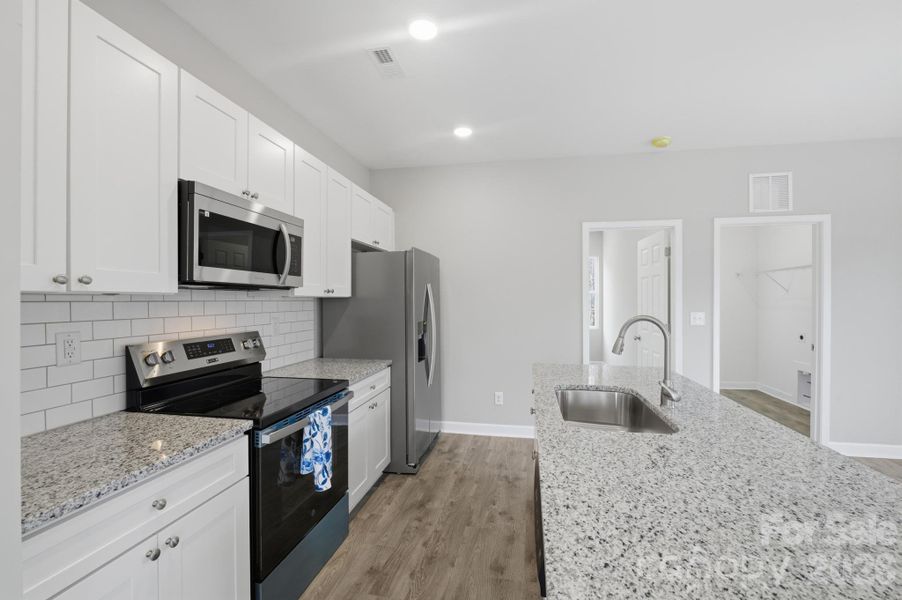 Furnished interior view inside a new home in , Statesville (Image 8).