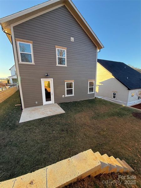 Exterior details and patio area of a home in , Weaverville (Image 24).